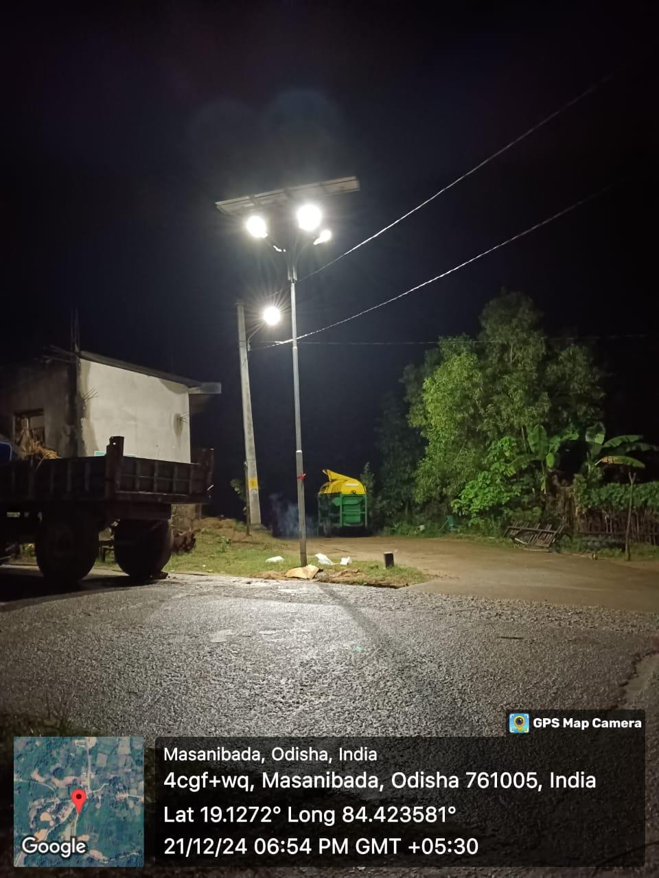 Solar street light installation in progress, Odisha